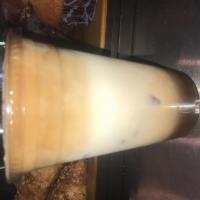 Iced Latte · Espresso with steamed milk topped with thin layer of foam.