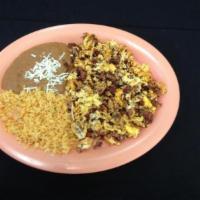 Chorizo and Eggs Breakfast · Scrambled eggs with chorizo, rice, beans and tortillas.