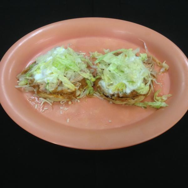 2 Sopes · Cheese, beans, sour cream, guacamole, lettuce and choice of meat.