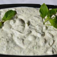 Mast o' Khiar · Yogurt with cucumber, mint and herbs.