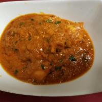 Curry · Choice of your meat cooked with ground spices and fresh herbs in its own sauce.