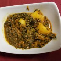Sag Aloo · Fresh spinach sauteed in a curry sauce with onion and garlic then cooked with potatoes.