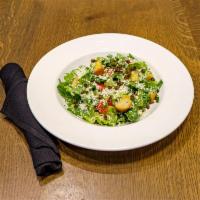 Caesar Salad · Romaine heart, queso fresco, crispy capers, tomatoes, croutons and sugar cane dressing.