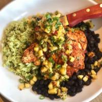 Caribbean Grilled Chicken · Pineapple salsa, cilantro rice and adobo black beans.