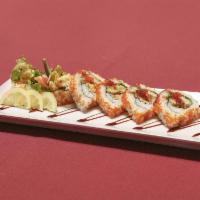 Spider Roll · Soft shell crab, avocado, cucumber and and tobiko.