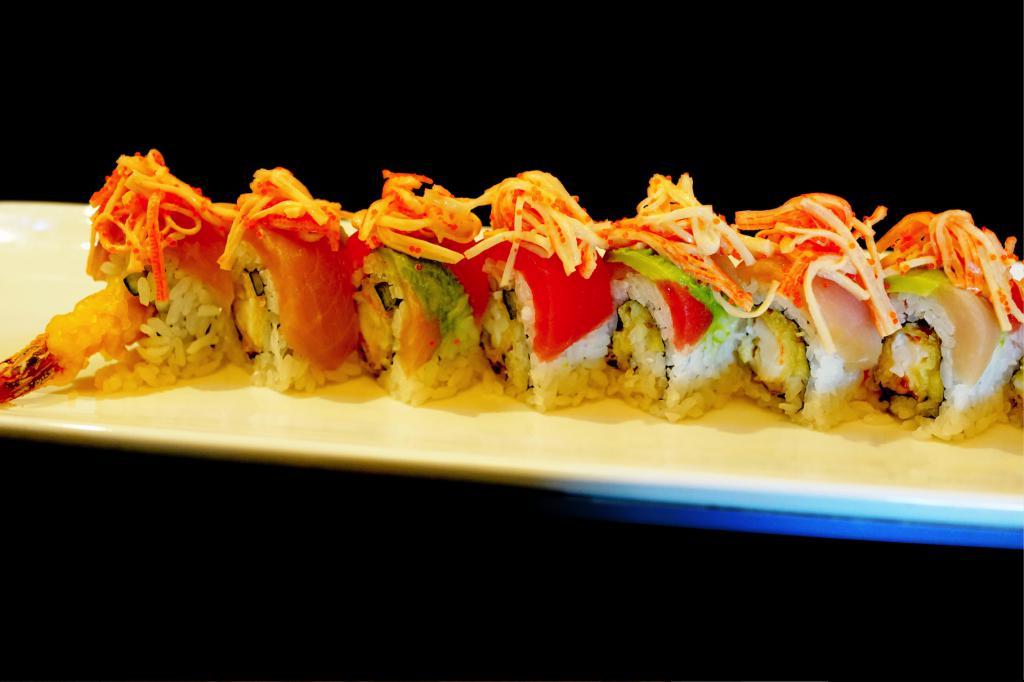 The Power · Shrimp tempura, cucumber roll, topped with hamachi, maguro, avocado, spicy crab meat & tobiko