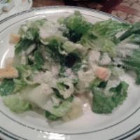Chicken Caesar Salad · A hearty helping of romaine lettuce, broiled chicken and topped off with traditional Caesar ...
