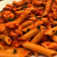 Penne All' Arrabiata · Garlic and basil in a spicy tomato sauce.