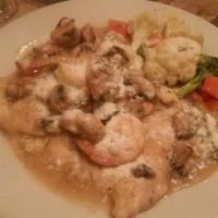 Pollo Alla Zia Teresa · Chicken breast sauteed in sherry, mushrooms, shrimp and Italian herbs.
