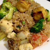 Veggie Fried Rice · An array of colorful vegetables stir-fried with tofu and jasmine rice. 