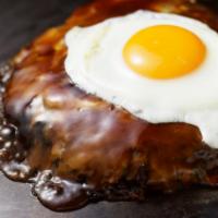 Deluxe Okonomiyaki · Everything okonomiyaki including pork, squid, shrimp and scallops topped with fried egg, ser...