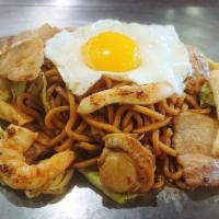 Deluxe Yakisoba · All-in stir fried noodles with pork, squid, shrimp, scallops and cabbage topped with fried egg