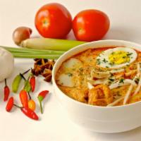 Laksa Chicken · Delicious bowl of rice noodles with tofu, fish cake, boiled eggs and bean sprouts added; ser...