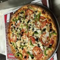 Vegetarian Pizza · Tomatoes, mushrooms, black olives, bell peppers and onions. Dough made fresh daily with just...