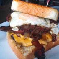 The Stache Favorite · Housemade bologna, smoked thick-cut bacon, caramelized onions, melted American cheese and a ...