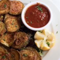 Fried Zucchini · Fresh zucchini lightly breaded and fried to a golden brown. Served with marinara sauce.
