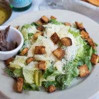 Caesar Salad · An Italian classic made with romaine lettuce, our creamy Caesar dressing and topped with sha...