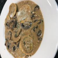 Portobello Mushroom Ravioli Dinner · Portobello mushroom ravioli in a mushroom Marsala cream sauce.