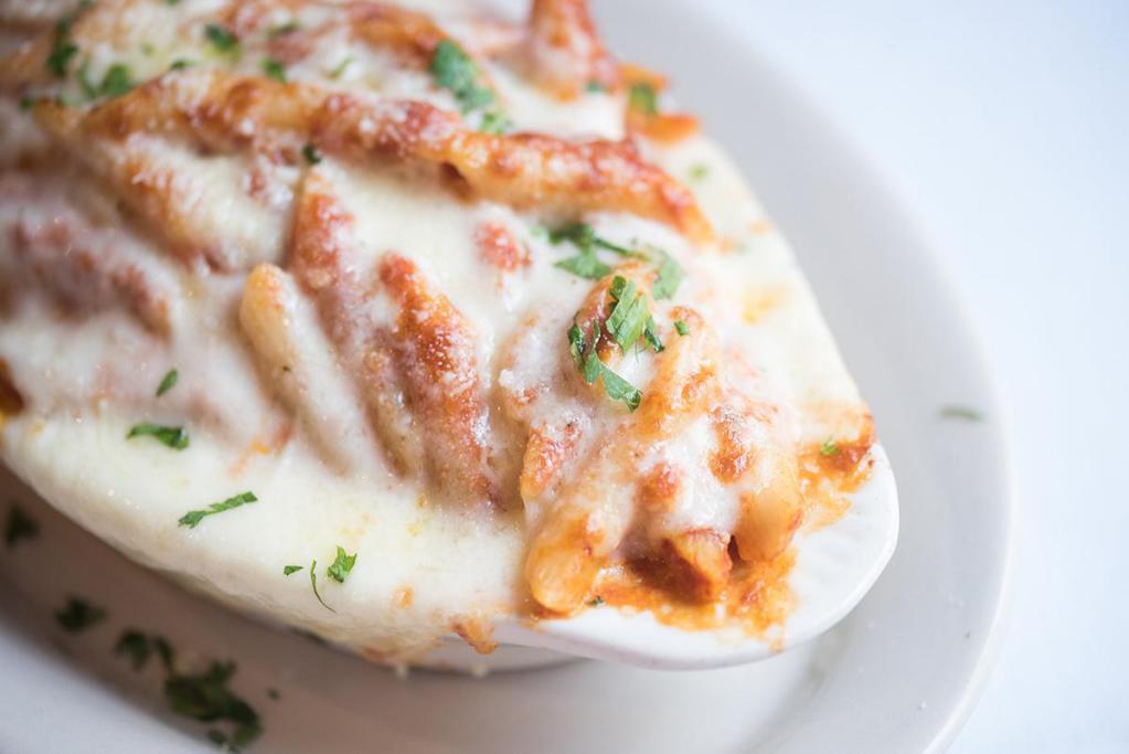 Baked Ziti Dinner · Penne pasta with ricotta cheese and tomato sauce topped with melted mozzarella cheese.