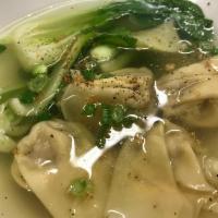 Wonton Soup · Shrimp and pork wontons and baby bok-choy in a clear broth. 