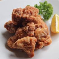 Chicken Karaage · Deep fried marinated chicken with soy sauce, ginger, and garlic served with spicy mayo sauce.