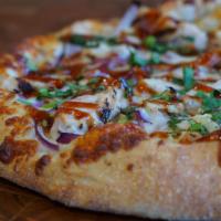 New ZBQ2 Chicken Pizza · Smoked mozzarella, red onions, BBQ chicken, BBQ sauce, cilantro.