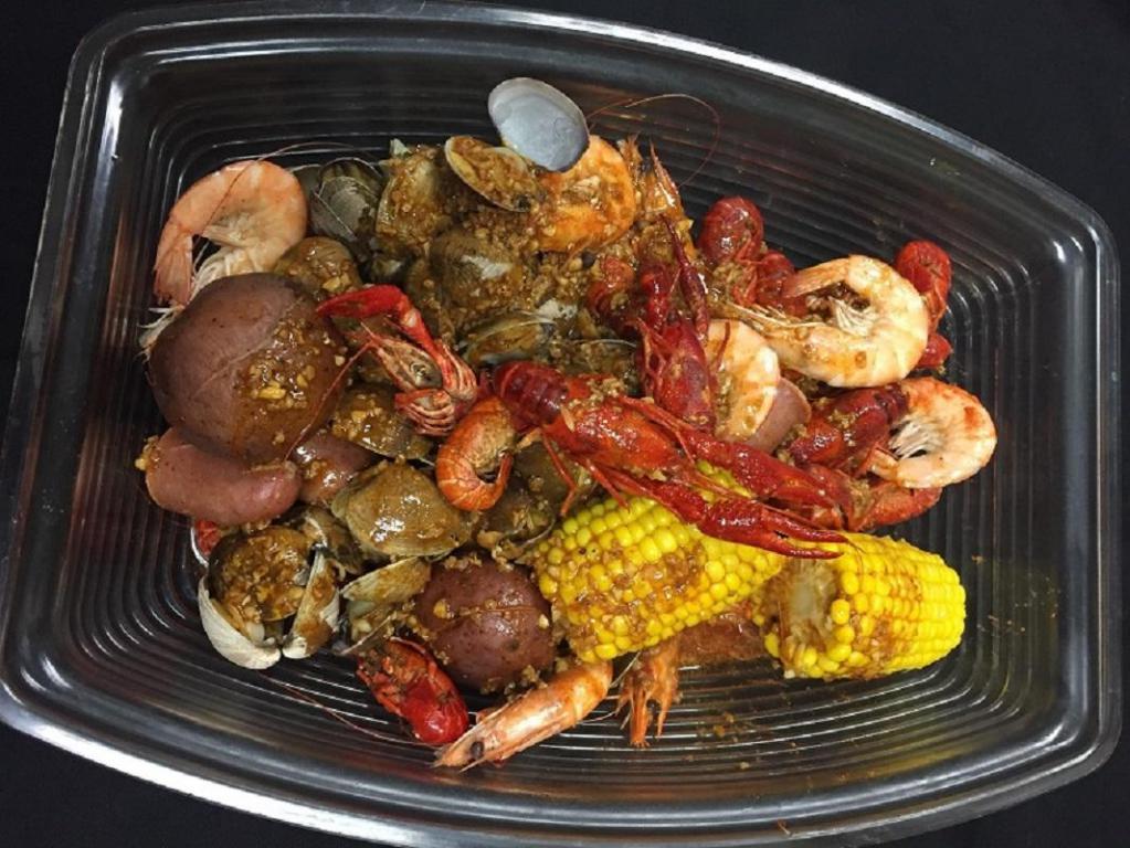 Combo #2 · Includes: 1 Appetizer and 3 seafood choices + Choose your Seasoning and Spice Level! Order comes standard with 2 corns, 2 potatoes, 4 sausages