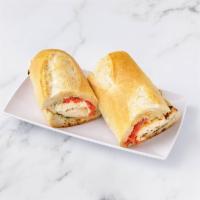 Pollo Italiano Sandwich · Grilled pesto chicken with fresh mozzarella and roasted peppers.