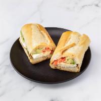 The Elf · Fresh mozzarella, avacado, roasted peppers topped with Annabella sauce on charred Italian.