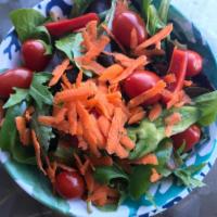 House Salad · Organic mixed greens with cherry tomatoes, red onion and shredded carrot. Choice of balsamoc...