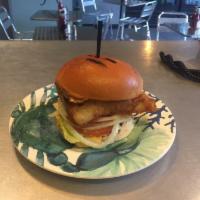 Fish Sandwich · Crispy, beer battered fish on one of our fresh rolls with lettuce, tomato, onion, and tartar...