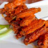 Jumbo Chicken Wings · 1 lb. of our famous dry rubbed chicken wings with your choice of honey BBQ, sweet chili sauc...