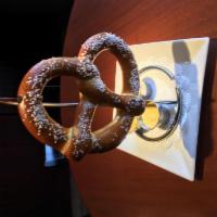 Jumbo Pretzel · Oven baked pretzel ,served with beer cheese,whole grain mustard and buffalo cheese dips
