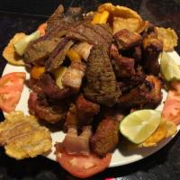 26. Picada Para Ti Colombia · Pork ribs, beef, pork skin, sausage, green plantain, potatoes, cassava and corn cake.