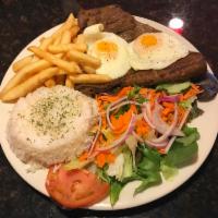49. Steak de la Casa · Grilled steak, rice, salad, fried eggs and french fries.