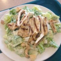 Caesar Salad · Romaine lettuce, croutons, Parmesan cheese and homemade Caesar dressing. Add grilled chicken...