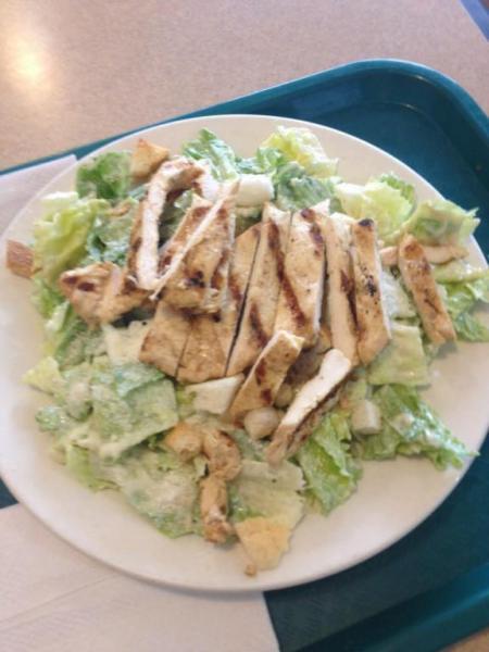 Caesar Salad · Romaine lettuce, croutons, Parmesan cheese and homemade Caesar dressing. Add grilled chicken for an additional charge.
