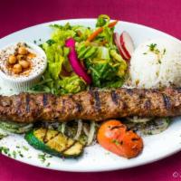 Adana Plate · Charbroiled ground lamb and beef. All plates served with rice, salad, hummus and pita bread....