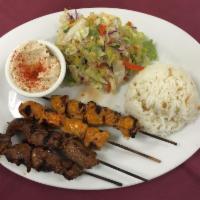 Combo Shish Plate · All plates served with rice, salad, hummus and pita bread.