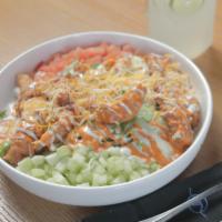 Buffalo Chicken Salad · Iceberg and romaine lettuce topped with buffalo chicken strips, cucumber, tomato, cheese mix...