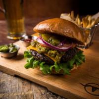 Hatch Chile Burger · 1/2 steakburger, green chile from Hatch NM, American cheese. Add bacon for an additional cha...