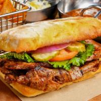 1/2 Lb Ribeye Sandwich · Thin sliced prime quality ribeye. All steaks burgers and sandwiches are served with steak fr...