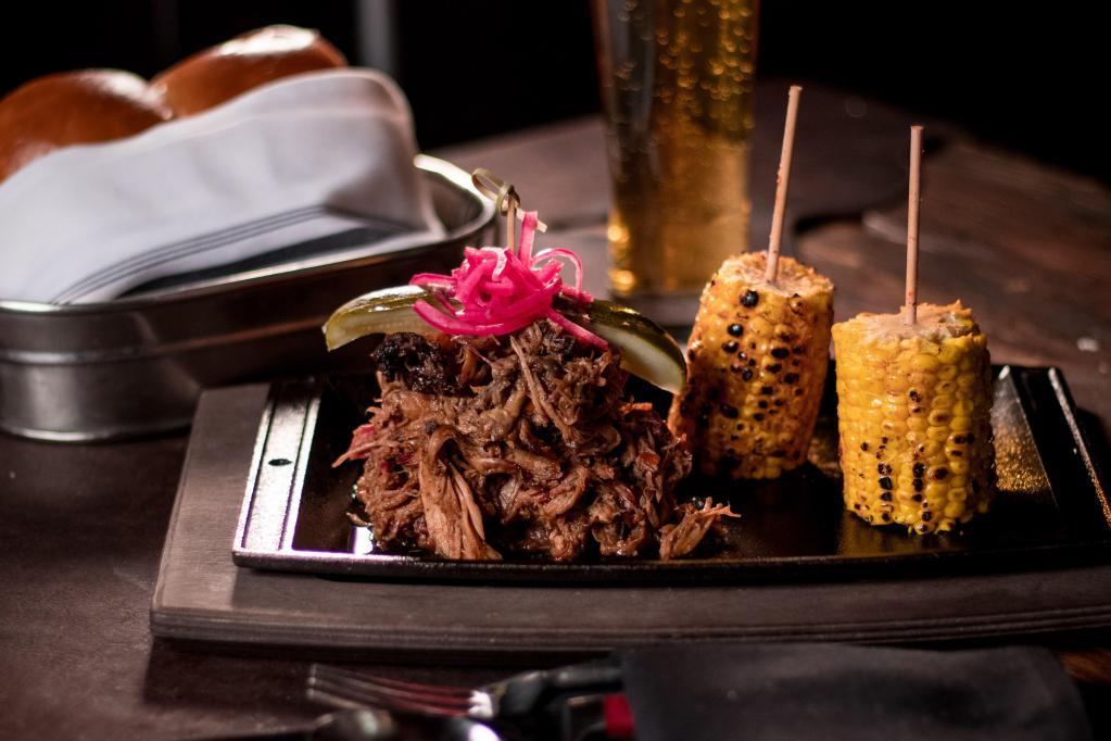 12 Oz Brisket Platter · Each entree includes complimentary pineapple coleslaw salad and beans.