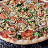 Vegan Delight Pizza · Spinach, mushrooms, Roma tomato, vegan cheese, house-made tofu ricotta. Vegan.