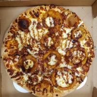 The Cowboy Pizza · Grilled chicken, beer-battered onion rings, bacon and Sweet Baby Ray’s honey BBQ sauce.