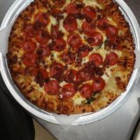 The Zombie Pizza · Bacon, Roma tomatoes, fresh spinach, pepperoni, fresh minced garlic, ranch dressing and grat...