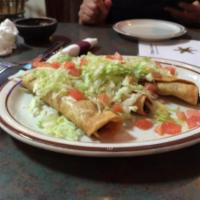 Taquito Trio · Served with guacamole, sour cream and lettuce.