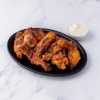 Chicken Wings ·  Choice of chicken wings, fried or roasted.