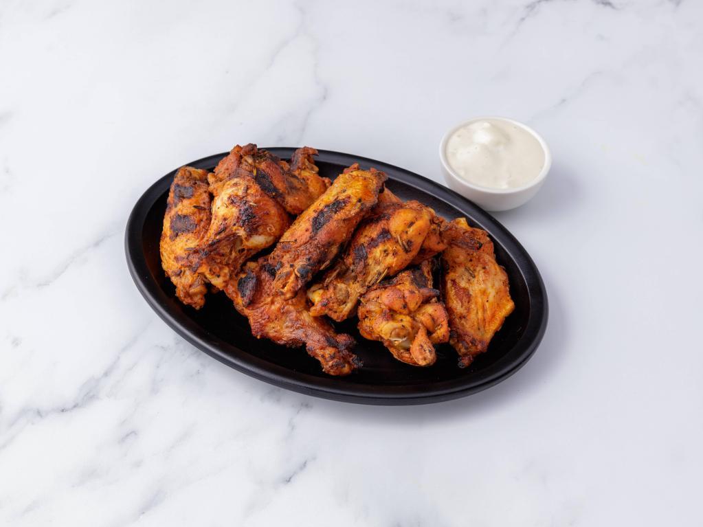 Chicken Wings ·  Choice of chicken wings, fried or roasted.