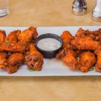 10 Buffalo Chicken Wings · Served with choice of sauce with a side of bleu cheese.